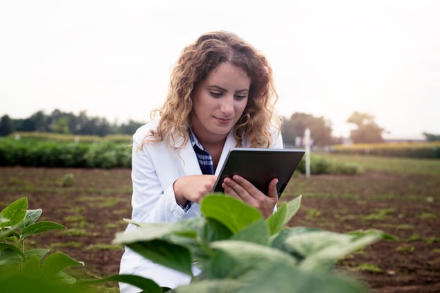female-technologist-agronomist-with-tablet-computer-field-checking-quality-growth-crops-agriculture (1)